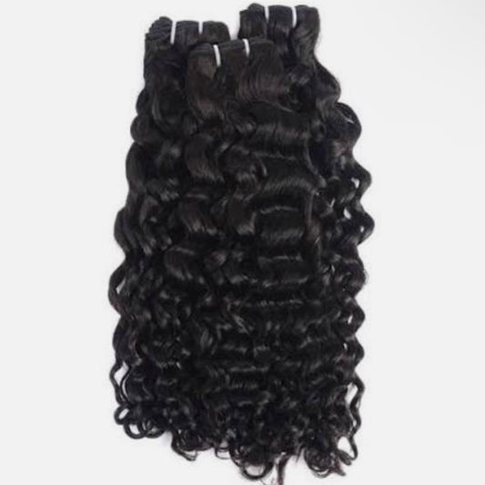 A bundle of curly hair extensions against a white background.